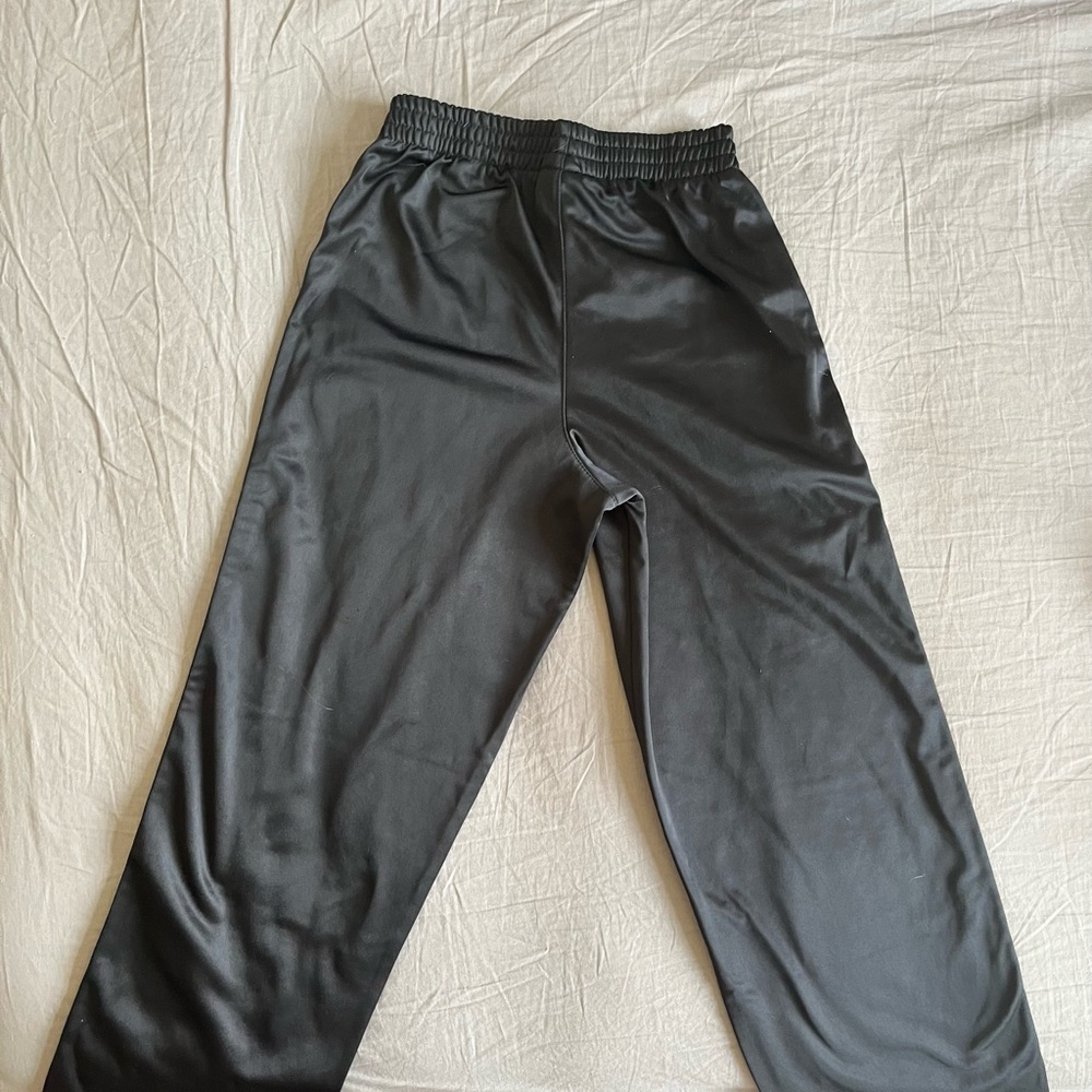 Black boys jogging pants with white strip down the side